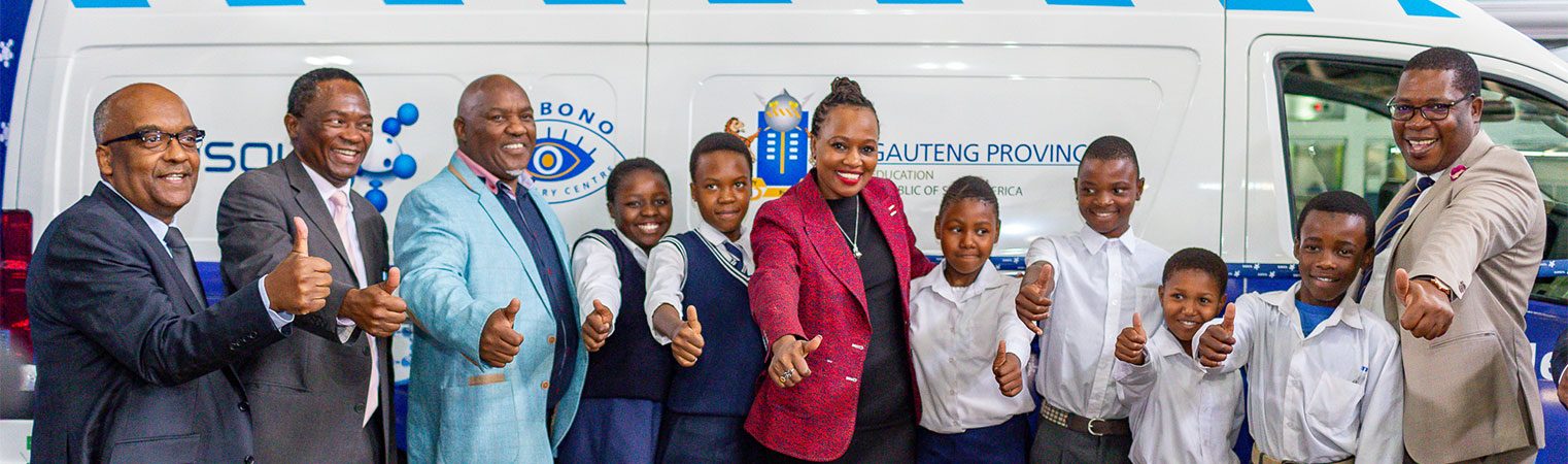 Sasol Foundation, MEC for Education Panyaza Lesufi and pupils infromt of the mobile science lab at Sci-bono