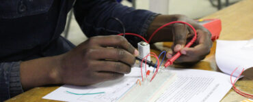 Student working on circuit board