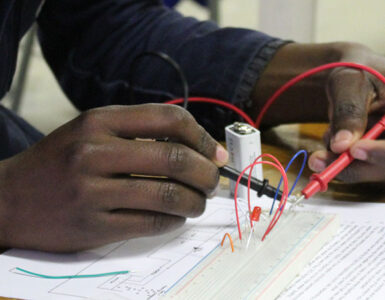 Student working on circuit board