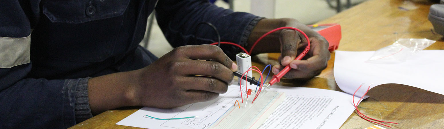 Student working on circuit board